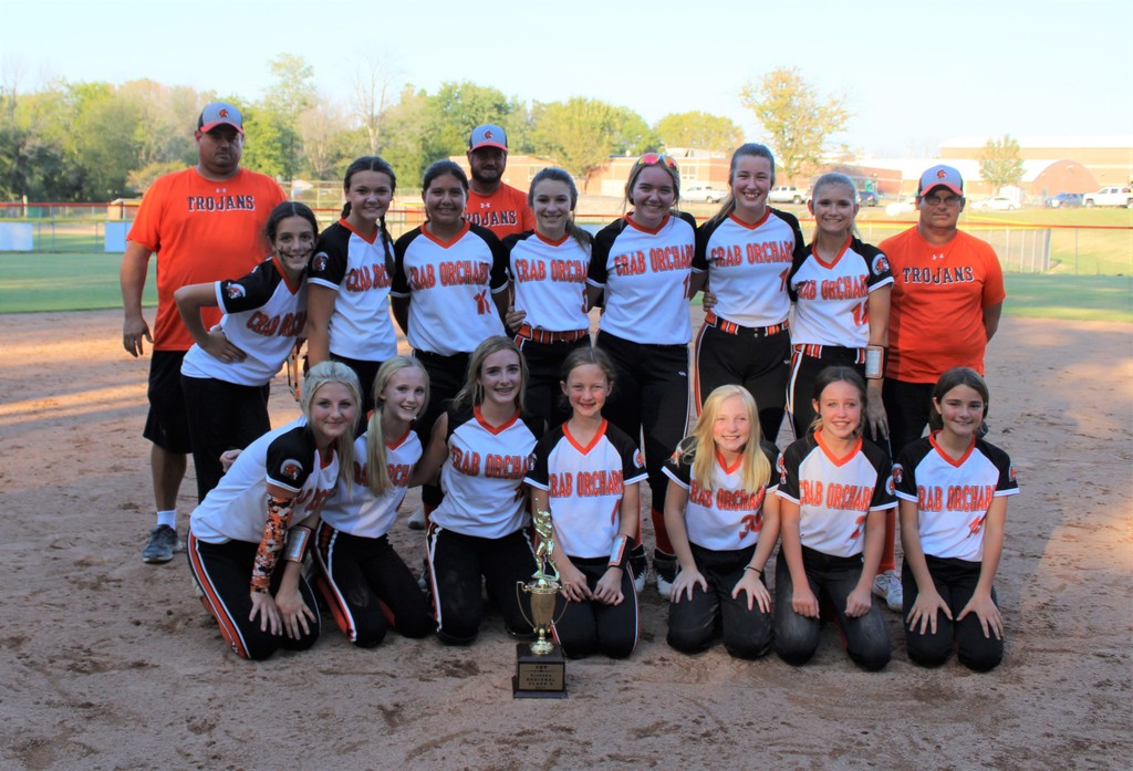 junior high softball girls and coaches with trophy