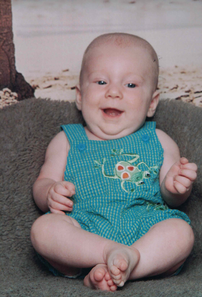 Baby boy picture with green frog onesie 