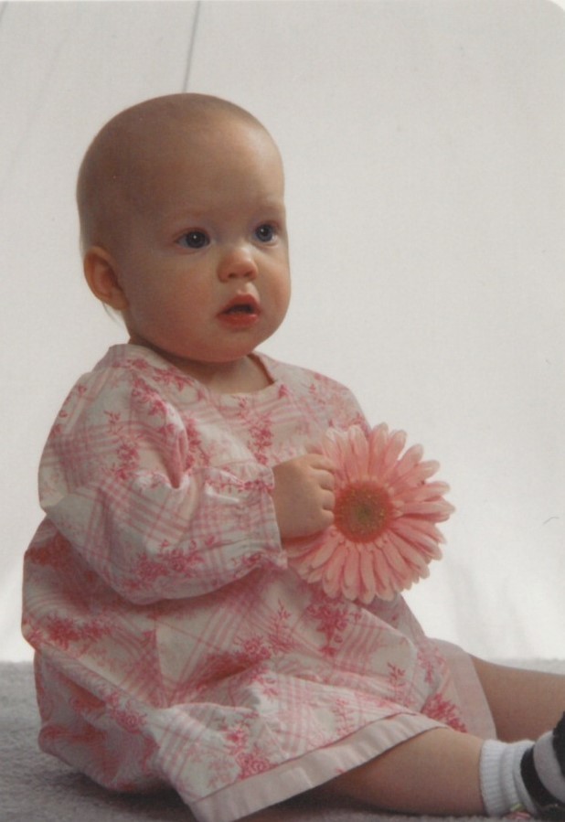 Baby girl picture with pink flower